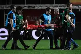 Luciano Sanchez, do Argentinos Juniors, é retirado de campo após a grave lesão sofrida em pisão de Marcelo, do Fluminense — Foto: Luis Robayo/AFP (Foto: CNN)