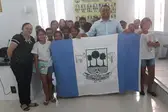 Professora e alunos junto ao presidente (Foto: )
