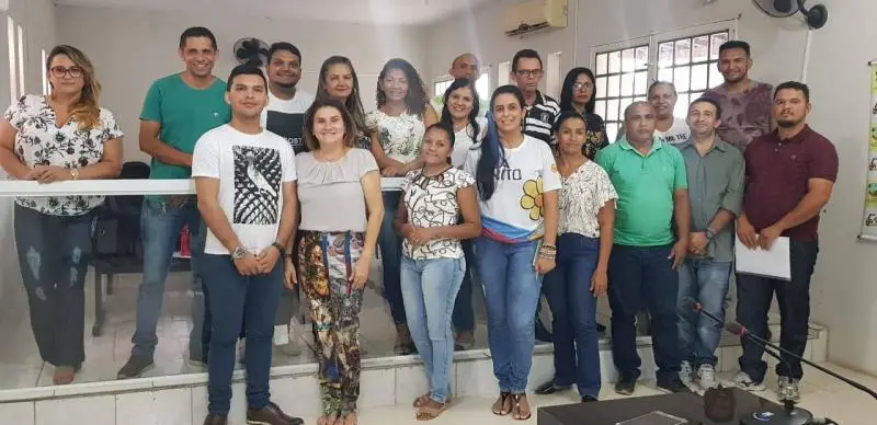 Professor Marcos com comissão e candidatos